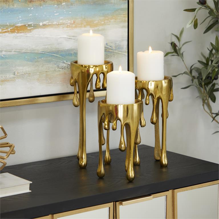 89930_3 Gold Aluminum Abstract Pillar Drip Candle Holder W/ Melting Designed Legs - Set of 3 - Image 1